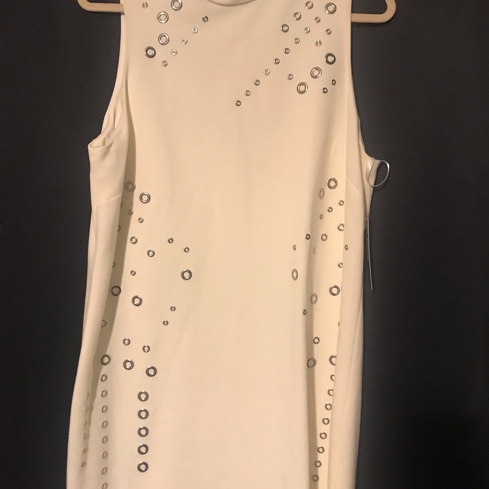 NWT Ivory White dress with round rivets.